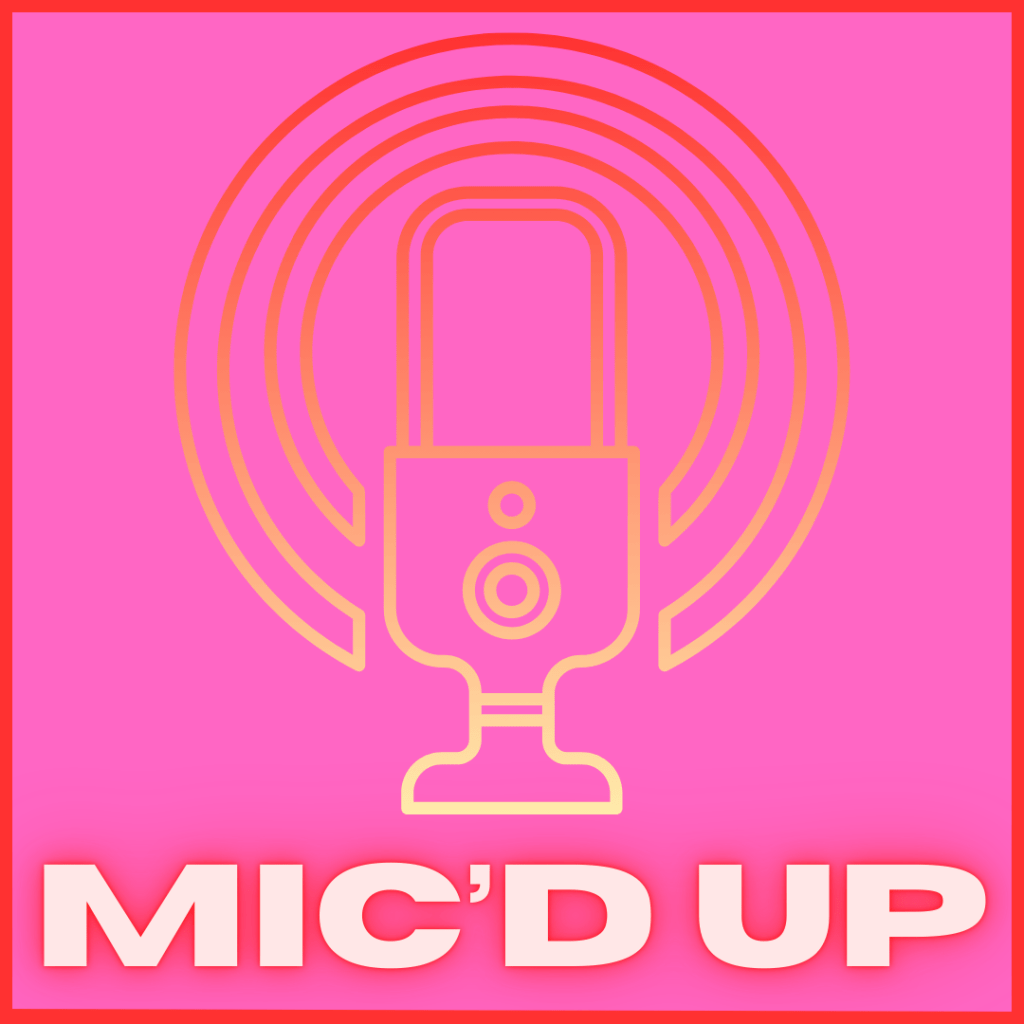 A pink background with a red border, a large microphone cartoon is at the centre coloured red, orange and white. Bright red text at the bottom reads 'Mic'd Up'